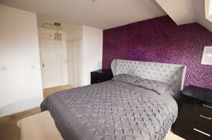Bedroom One- click for photo gallery
